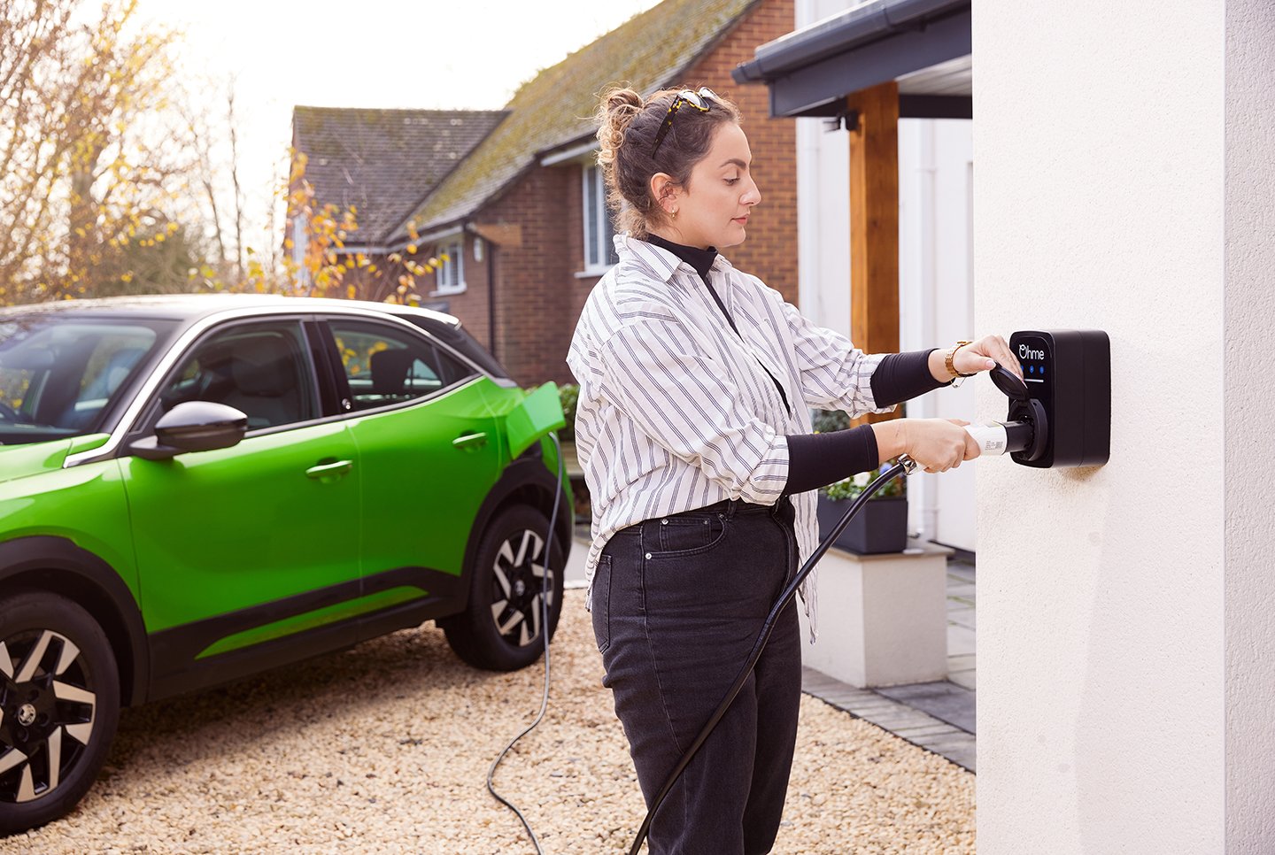 Ohme ePod EV charger with charging cable connected